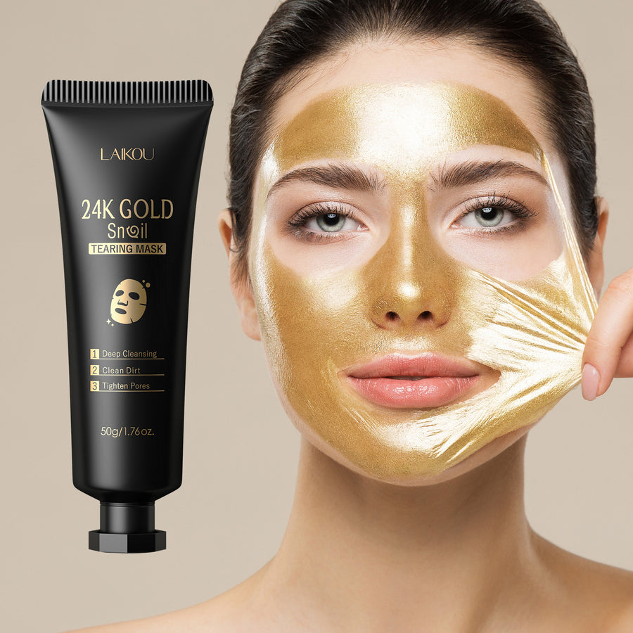 Woman wearing a gold face mask with a Lakou 24K Gold Snail Tearing Mask product on a beige background