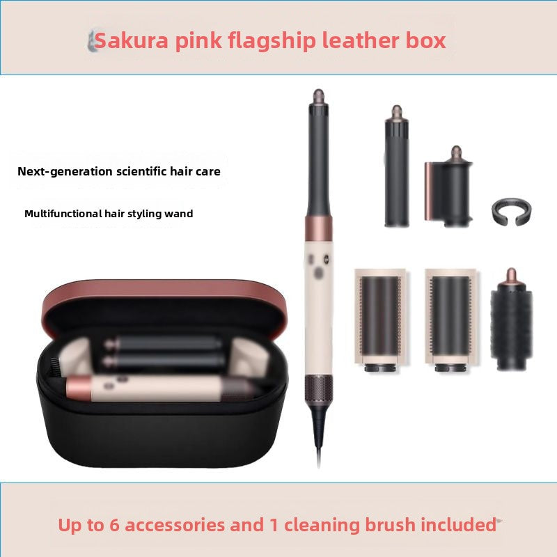Multifunctional hair styling wand with accessories in a Sakura pink flagship leather box.