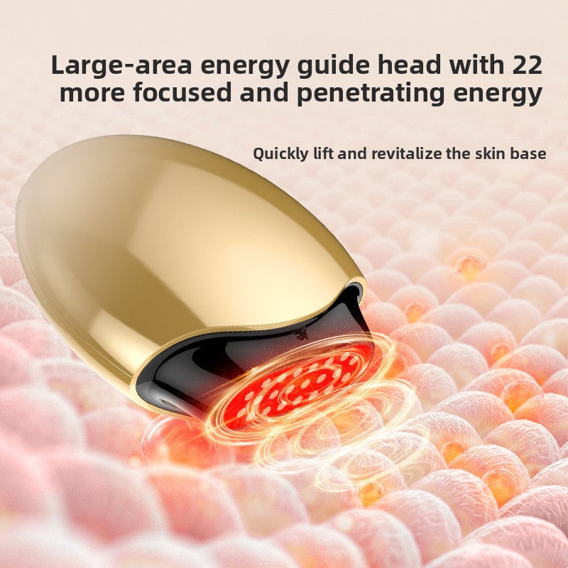 Gold energy guide head with glowing red center on a textured skin background
